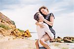 Couple on beach, Odessa, Ukraine