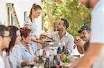 Family having lunch outdoors