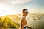 Man at view point during sunset, Rio de Janeiro, Brazil