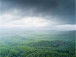 Mountain range during a rain storm in a rural environment