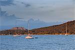 Mooring sailboats during the sunset (Ile de Porquerolles, Hyeres, Toulon, Var department, Provence-Alpes-Cote d'Azur region, France, Europe)