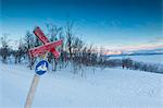 Signboard on the snowy ski slopes, Bjorkliden, Abisko, Kiruna Municipality, Norrbotten County, Lapland, Sweden