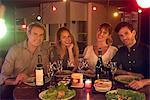 Group of friends enjoying dinner party