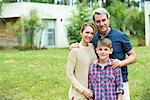 Family together outdoors, portrait