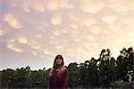 Young woman outdoors at twilight