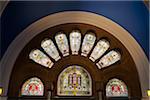 Arch with stained glass windows over the George Street entrance of the Queen Victoria Building in the Central Business District of Sydney, Australia