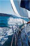 Waves splashing against sailboat while sailing around the Whitsunday Islands in Queensland, Australia