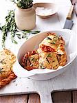 Pork belly and porcini calzone, in white serving bowl