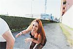 Red haired woman laughing