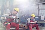 Factory workers taking coffee break