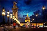 Pont Alexandre III and Les Invalides in Paris in the evening, France