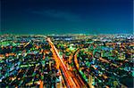 The image of the night city from the height of a bird's flight.A view of the night Osaka.Mnogo houses in iluminatsii.Dark time of the day
