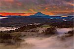 Foggy sunrise over Mount Hood and Sandy River Valley from Jonsrud Viewpoint in Sandy Oregon