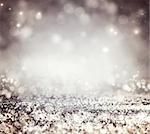 Festive background. Bokeh blurred background. Glitter vintage lights