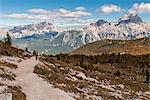 Europe, Italy, Veneto, Belluno, Cortina d Ampezzo. Woman hiker proceed from the Federa lake, Dolomites