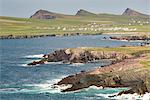 Irish coast with Three Sisters peaks on the background. Dingle Peninsula, Co.Kerry, Munster, Ireland, Europe.