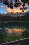 Carezza lake at sunset, Bolzano province, Trentino Alto Adige, Italy.