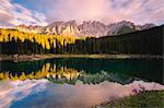 Carezza lake at sunset, Bolzano province, Trentino Alto Adige district, Italy, Europe.