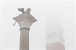 St Mark's bell tower in the fog. Venice, Veneto, Italy.