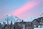 The magical colours of the dawn at the Belvedere Tower at the Maloja Pass in Engadine, Switzerland