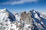 Aerial view of the granite peaks between Val Masino and Val Bondasca in winter with Pizzo Cengalo secondary. Val Bondasca, Val Bregaglia, Canton of Grisons, Switzerland Europe