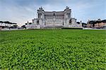 Dusk lights on the green gardens surrounding The Altare della Patria also known as Vittoriano Rome Lazio Italy Europe