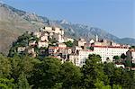 The old citadel of Corte perched on the hill surrounded by mountains Haute-Corse Corsica France Europe