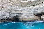 The turquoise sea framed by granite white cliffs and sea caves Lavezzi Islands Bonifacio Corsica France Europe