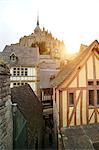 View of timber framed houses and Mont Saint-Michel, Normandy, France