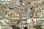 Detail of traditional house exteriors and rooftops, Ragusa, Sicily, Italy