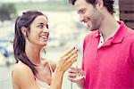 Man and woman clinking glasses of champagne