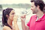 Man and woman drinking champagne together