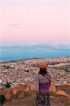 North Africa,Morocco,Fes district, Medina of Fes. Girl looking at city view
