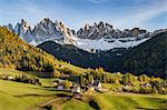 Autumnal landscape with Odle Dolomites peaks on the background. Santa Maddalena, Funes, Bolzano, Trentino Alto Adige - Sudtirol, Italy, Europe.
