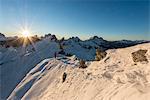 Nuvolau, Dolomites, Veneto, Italy. Mountaineer on the ridge to the summit of Nuvolau.