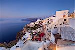 View of the Aegean Sea from the typical greek village of Oia at dusk Santorini Cyclades Greece Europe