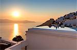 Sunset over the Aegean Sea seen from the old village of Firostefani Santorini Cyclades Greece Europe