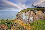 Sunrise on the cape and lighthouse of Cabo da Roca overlooking the Atlantic Ocean Sintra Portugal Europe