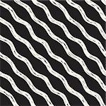 Decorative seamless pattern with handdrawn doodle lines. Hand painted grungy wavy stripes background. Trendy endless freehand texture