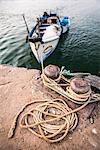 Fishing boats in a port at Talpona Beach, South Goa, India, Asia