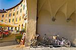 Parked bicycles at Piazza dell Anfitreatro, Lucca, Tuscany, Italy, Europe