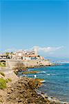 Fisherman overlooking the Old Town of Antibes, Provence, France, Mediterranean, Europe