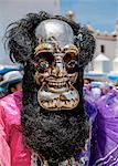 Masked dancer in traditional costume, Fiesta de la Virgen de la Candelaria, Copacabana, La Paz Department, Bolivia, South America