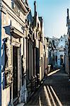 Vaults in evening sun in La Recoleta Cemetery, which lies right in the heart of the city, Buenos Aires, Argentina, South America