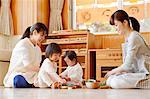 Teachers with kids at Japanese kindergarten