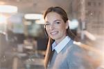 Portrait smiling, confident businesswoman wearing headset in office