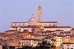 Cityscape view of Siena Cathedral at dusk, Siena, Tuscany, Italy