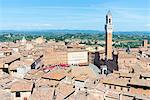 Cityscape view of rooftops and Torre del Mangia, Siena, Tuscany, Italy