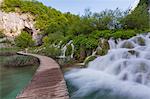 Plitvice National park, Croatia. A catwalk and a waterfall.