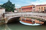 Prato della Valle, the Loggia Amulea, Padua. Prato della Valle, one of the symbols of Padua is a great elliptical square characterized by a green island in the center, called Memmia Island, surrounded by a canal.